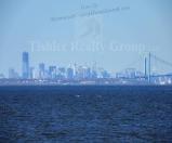 Actual zoomed in view of NYC and the new Freedom Tower from Keansburg beach just right across the street!